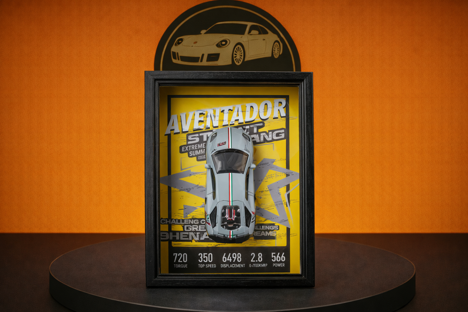 1:18 scale model of Lamborghini Aventador displayed in a black frame with yellow backdrop and car specs
