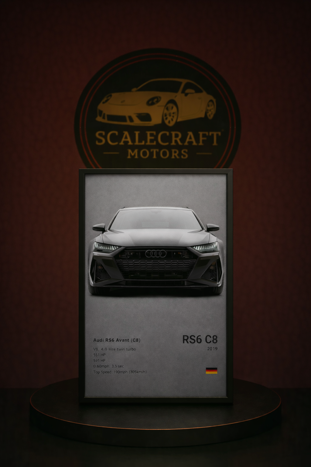 Framed poster of Audi RS6 Avant C8 2019 with specs, displayed on pedestal with ScaleCraft Motors logo backdrop
