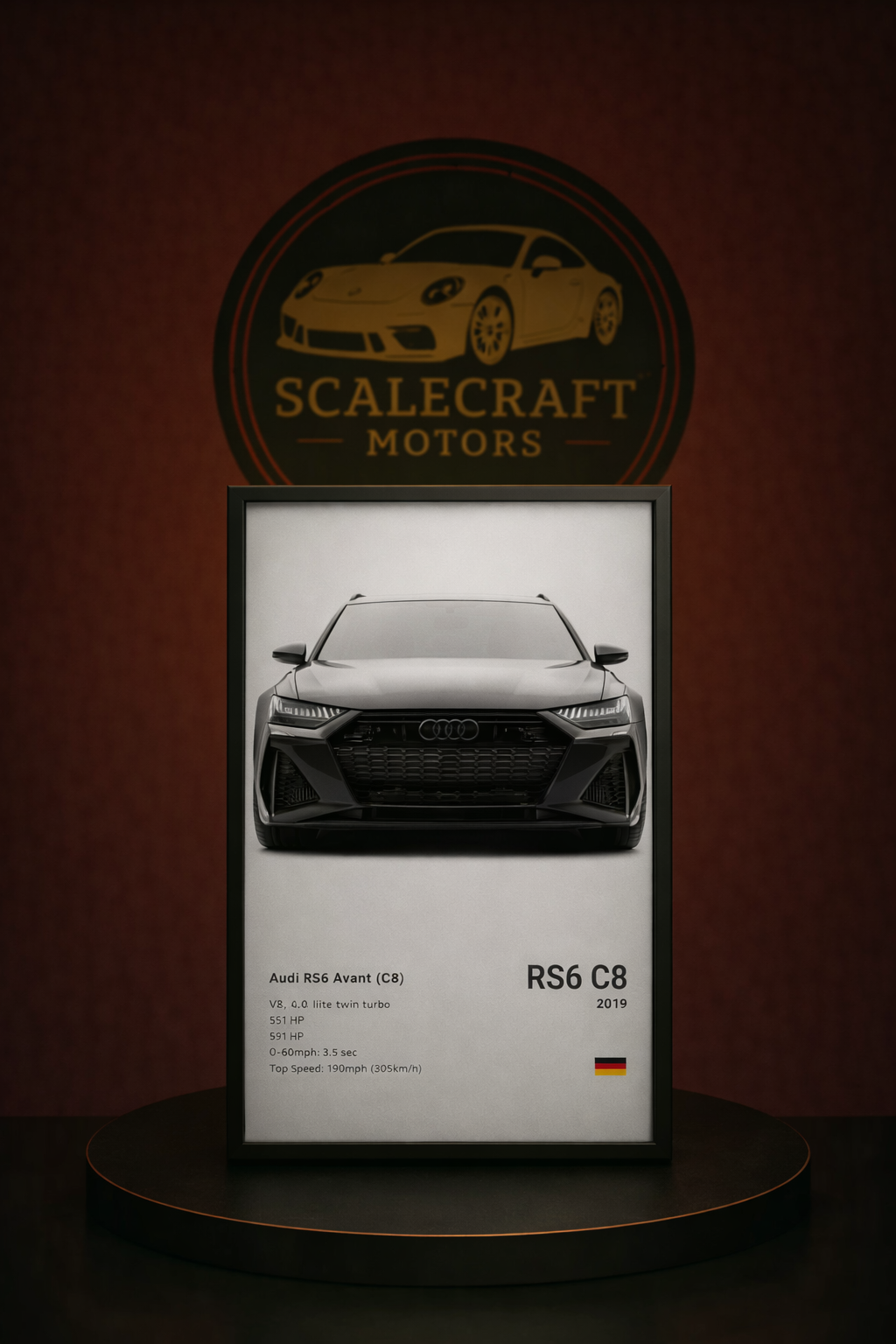 Framed poster of a black Audi RS6 Avant C8 2019 model displayed on a pedestal with ScaleCraft Motors logo backdrop